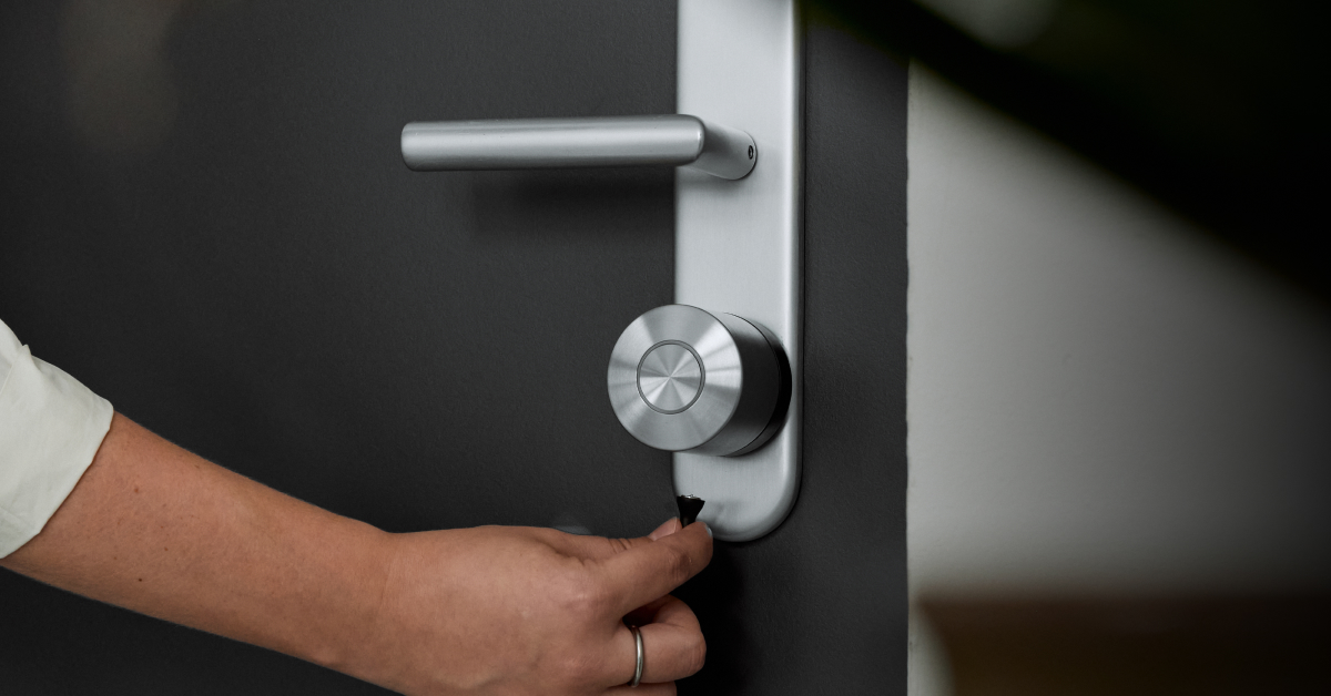 Smart lock installation technician in action